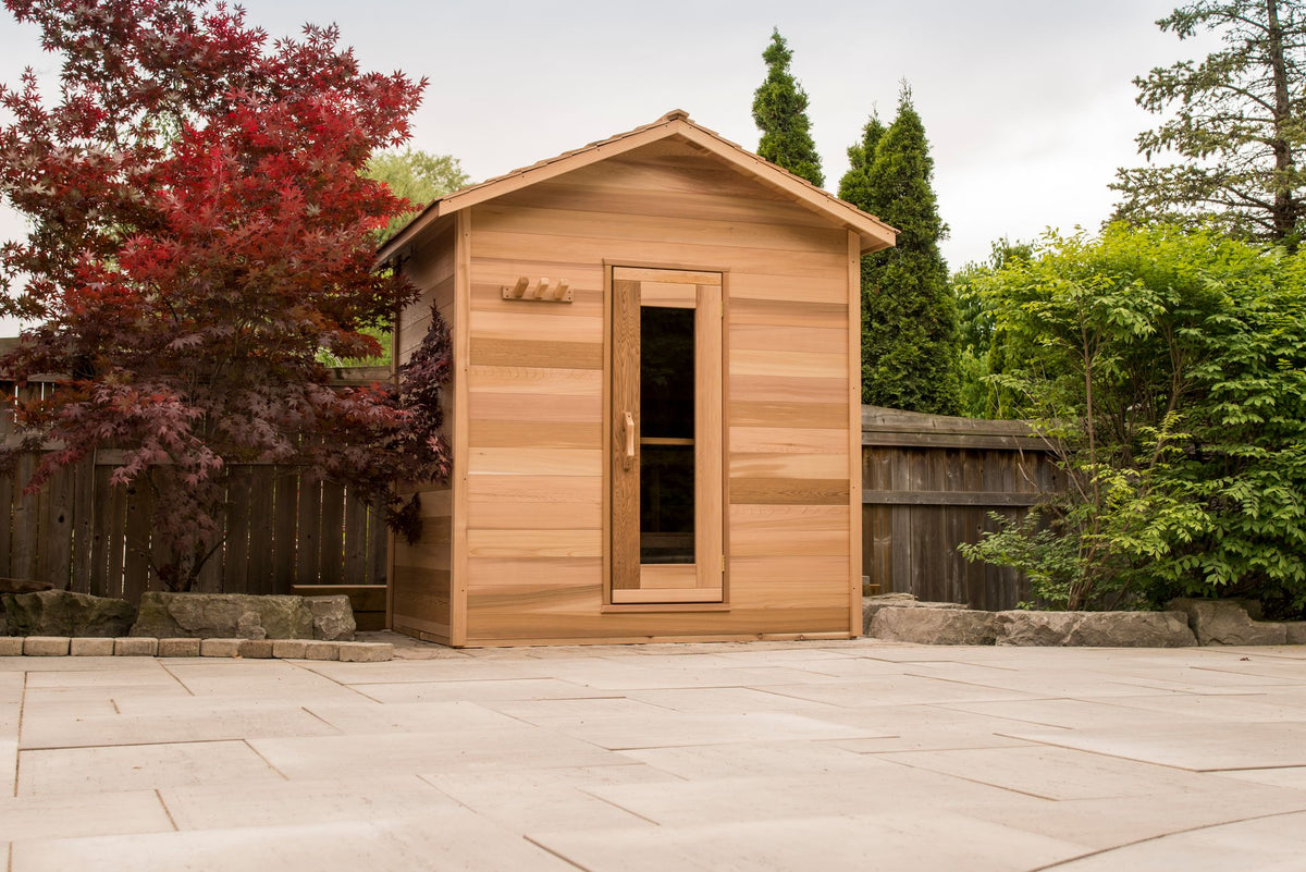 Cabin sauna with cedar shingle roof