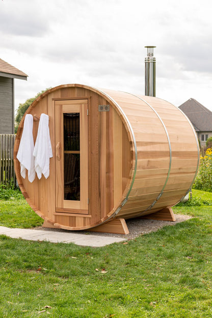 Clear red cedar barrel sauna with towels