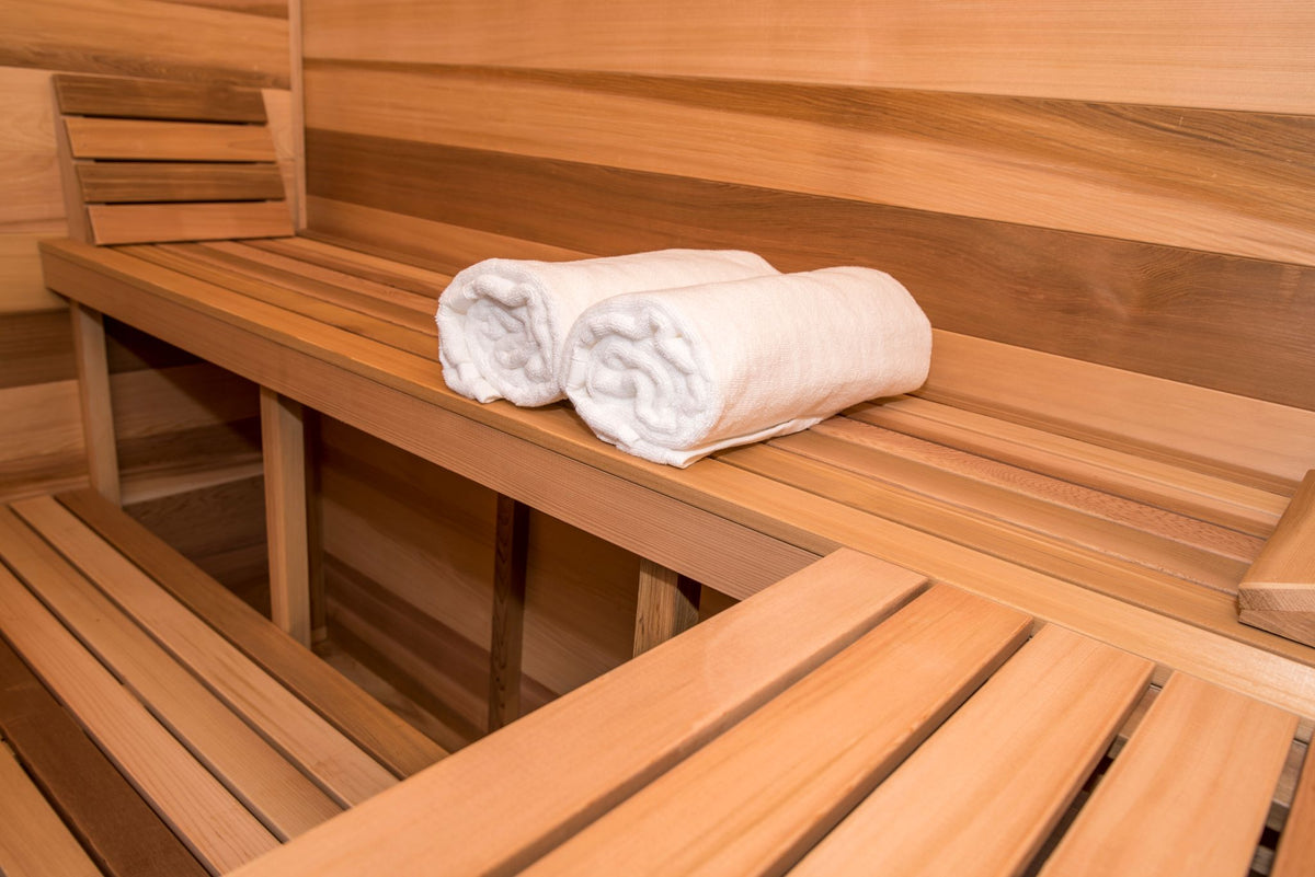 Cabin sauna cedar benches with towels