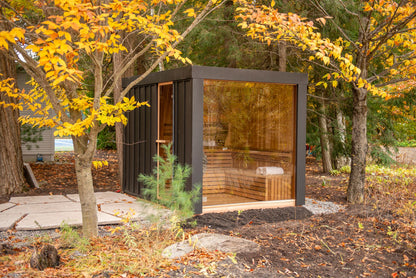 Neptune outdoor sauna on a stone patio