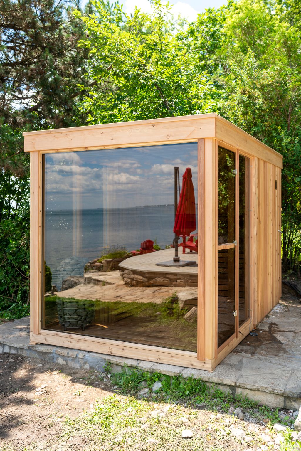 Orion cedar sauna with 180 degree glass overlooking the water