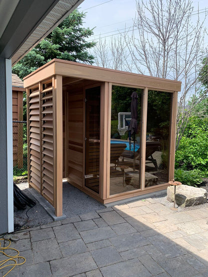 Pure Cube sauna with outdoor shower and louvred panels