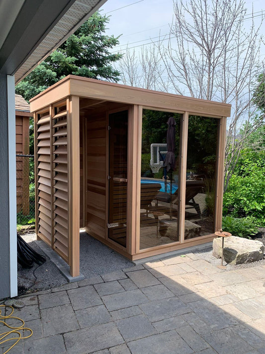 Pure Cube sauna with outdoor shower and louvred panels