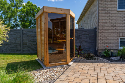 Trinity sauna on a paver patio